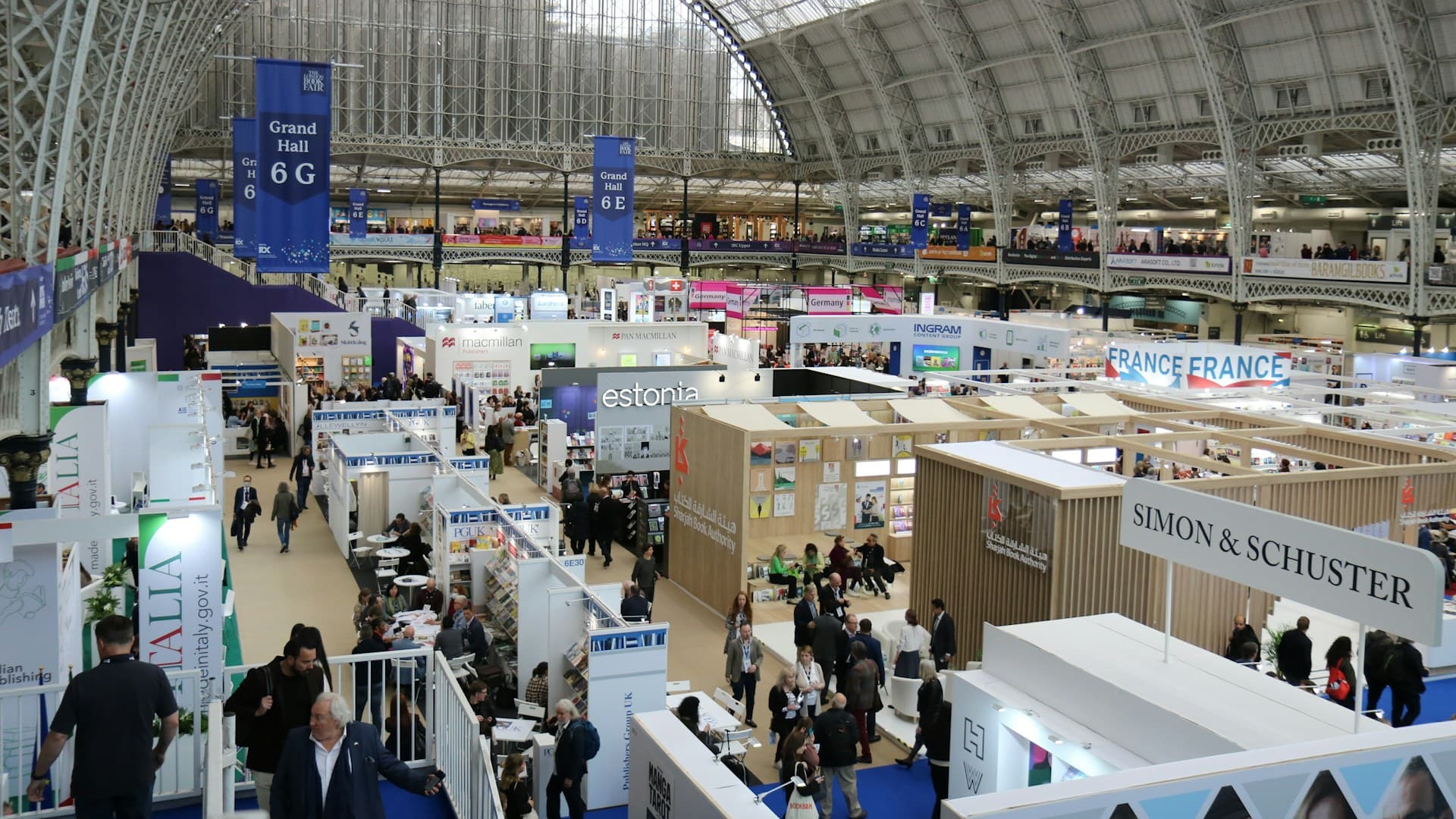 Exhibition hall with stands and visitors