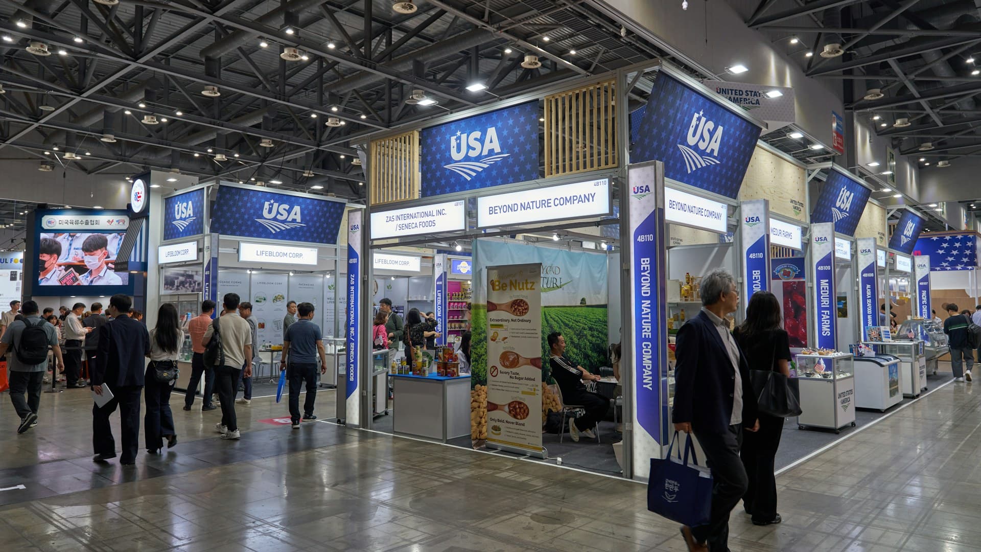 Crowded exhibition hall seen from above